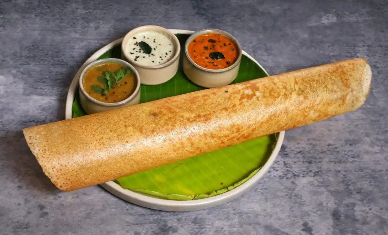 Dosa - A thin, crispy crepe made from the same batter as idli but cooked on a hot griddle. Variants: plane Dosa, Masala Dosa, Rava Dosa, Onion Dosa.