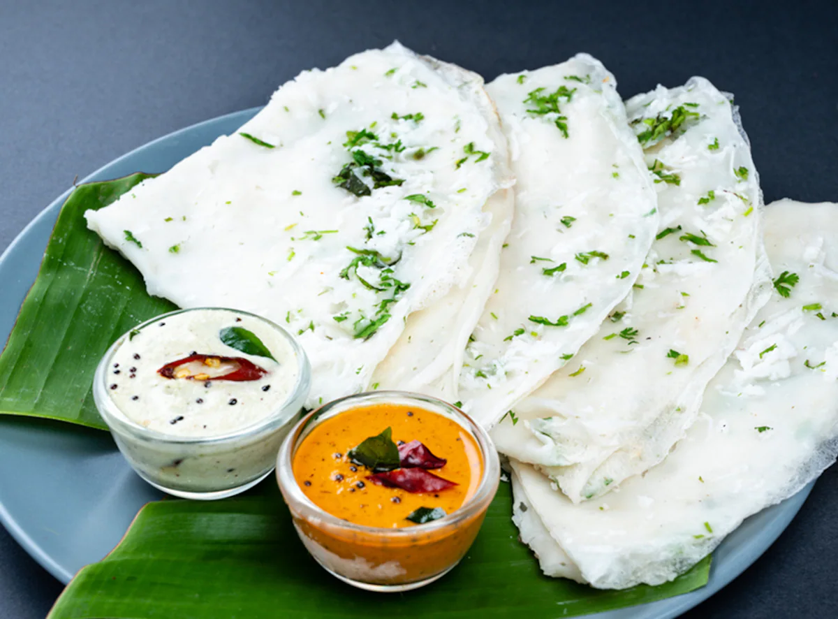Neer Dosa - A thin, delicate rice crepe from Karnataka. No fermentation needed. Why it’s healthy: Minimal oil, gluten-free, and light.